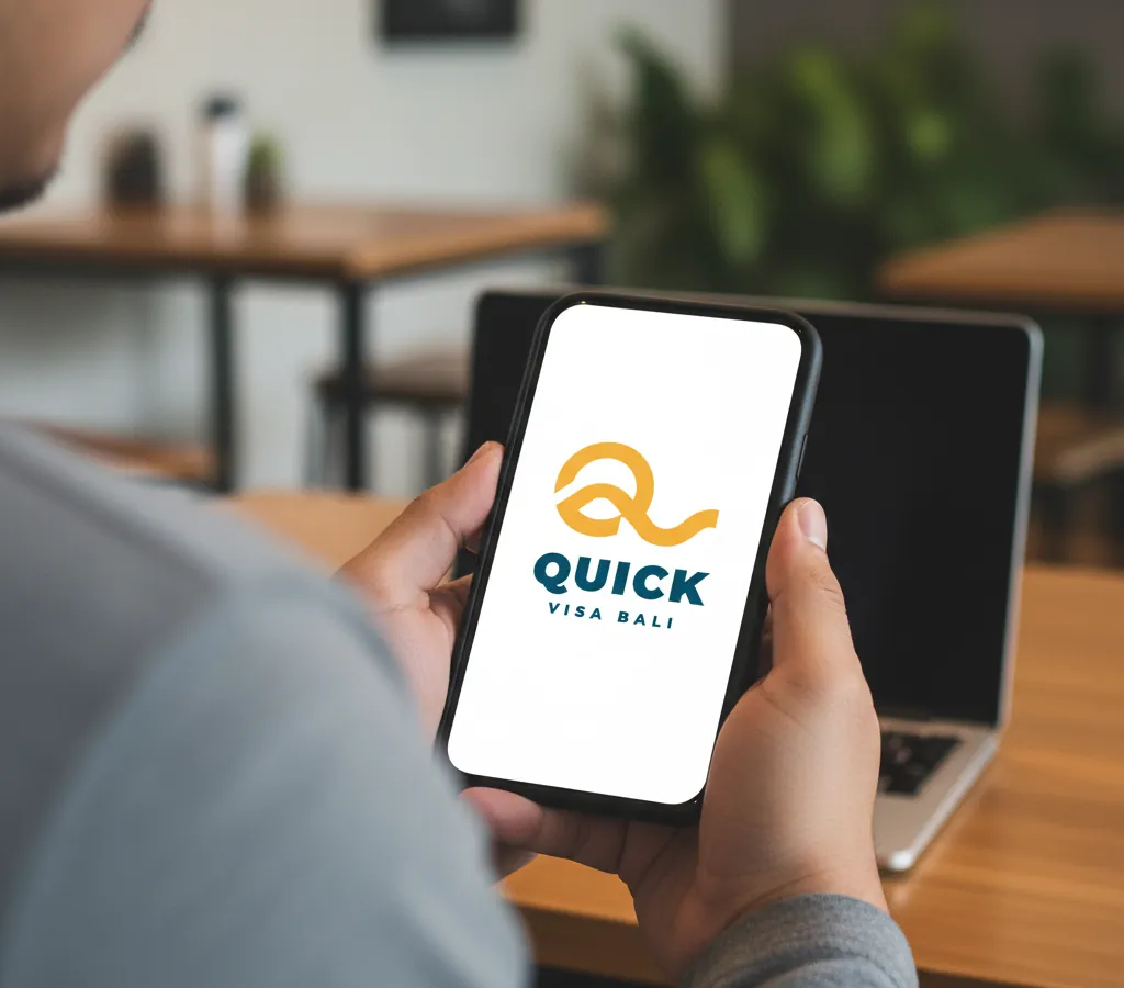Phone showing the Quick Visa Bali logo
